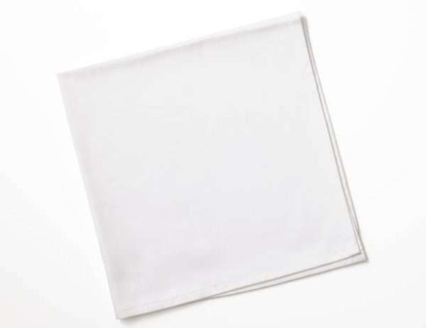 A white cotton table napkin. It is ideal for formal dinners, weddings, hotels and restaurants in Kenya.
